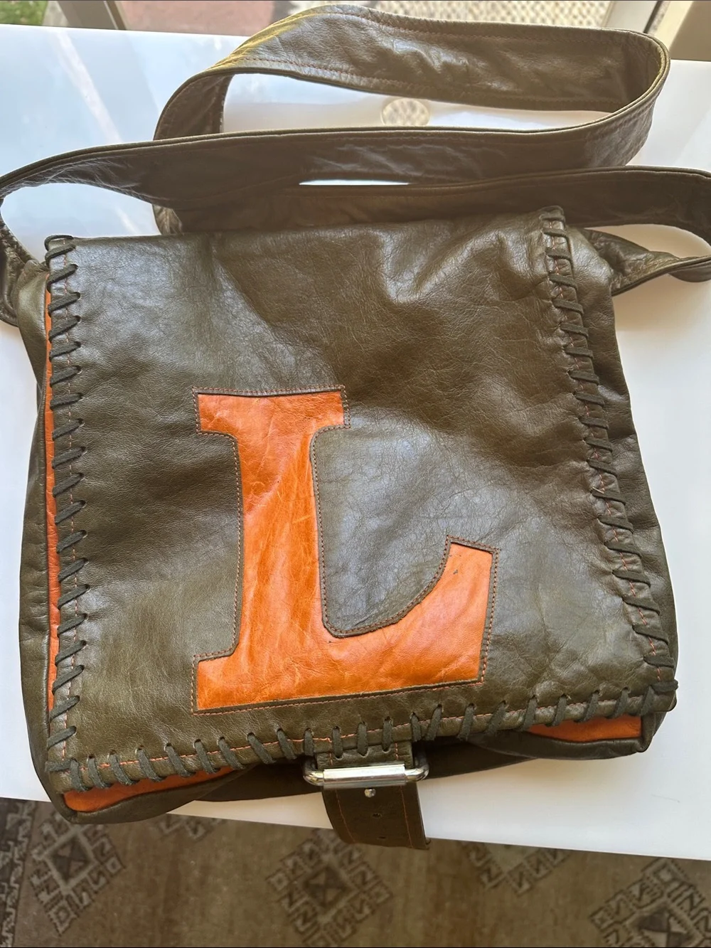 Sandra Lea Leather Messenger Bag with Orange 'L' Accent